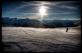 snowboard-alps-against-sun