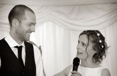 Bride Makes-a-Speech-While-Groom-Laughs