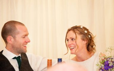 Laughing-At-The-Wedding-Table